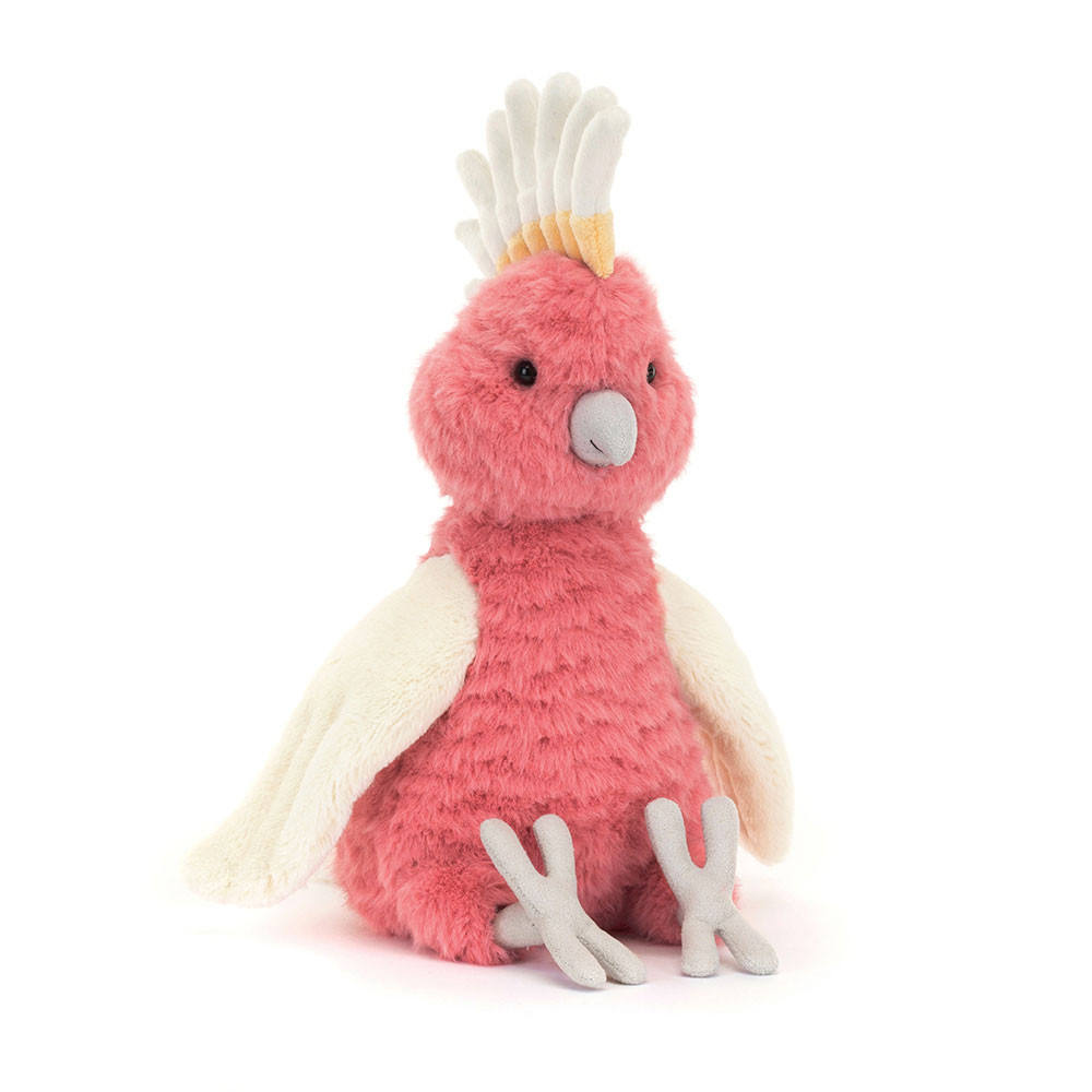 Side profile of the pink cockatoo stuffed bird showcasing its detailed layered feather crest and beak.